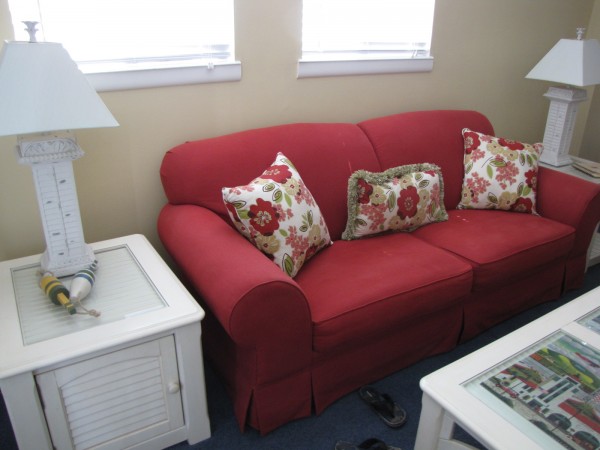 red couch, coastal decor