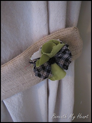plaid and green fabric flower on curtain tieback